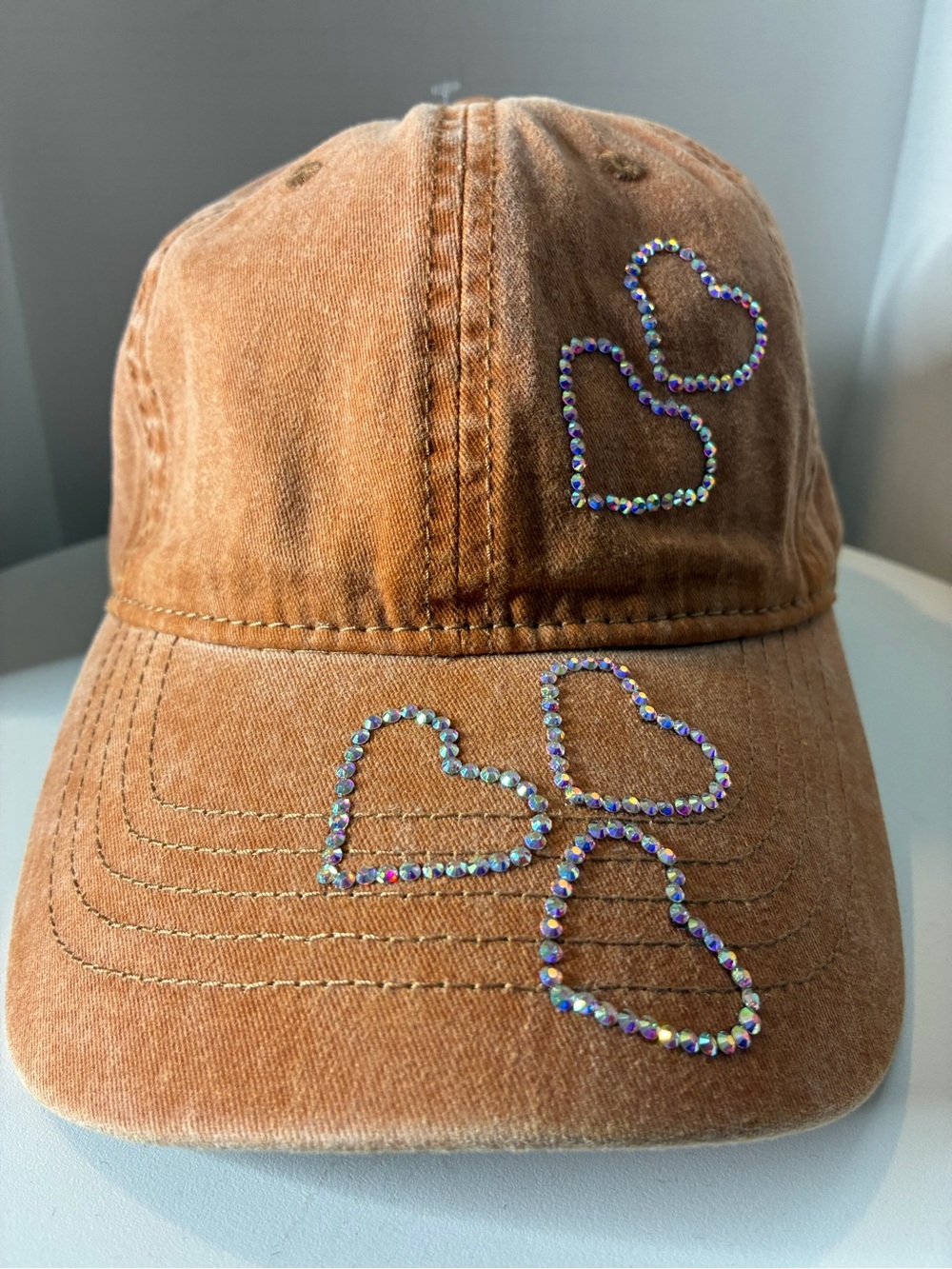 Women Orange Washed Cap with Iridescent rhinestone